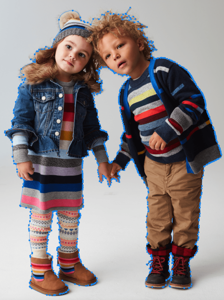 Two children wearing stylish winter outfits